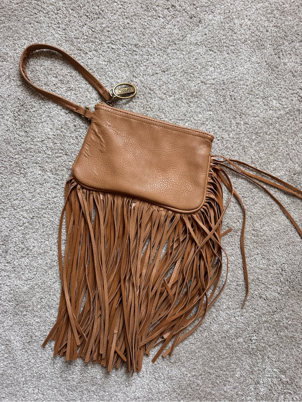 Carlos Santana fringe wristlet